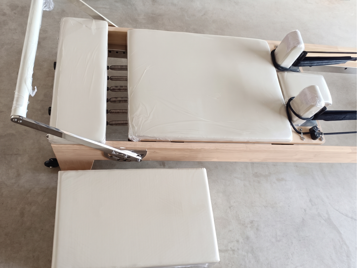 Reformly Original Pilates reformer in beige