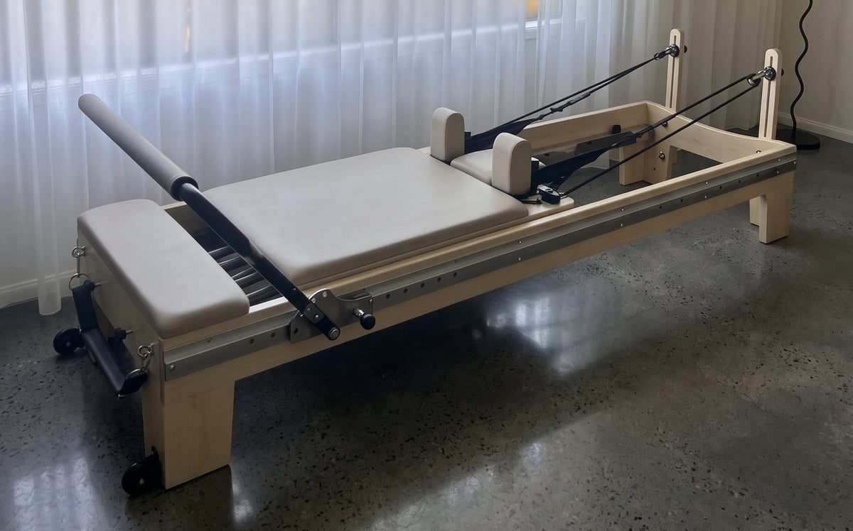 Beige Reformly Infinity - Full Track Footbar Pilates Reformer