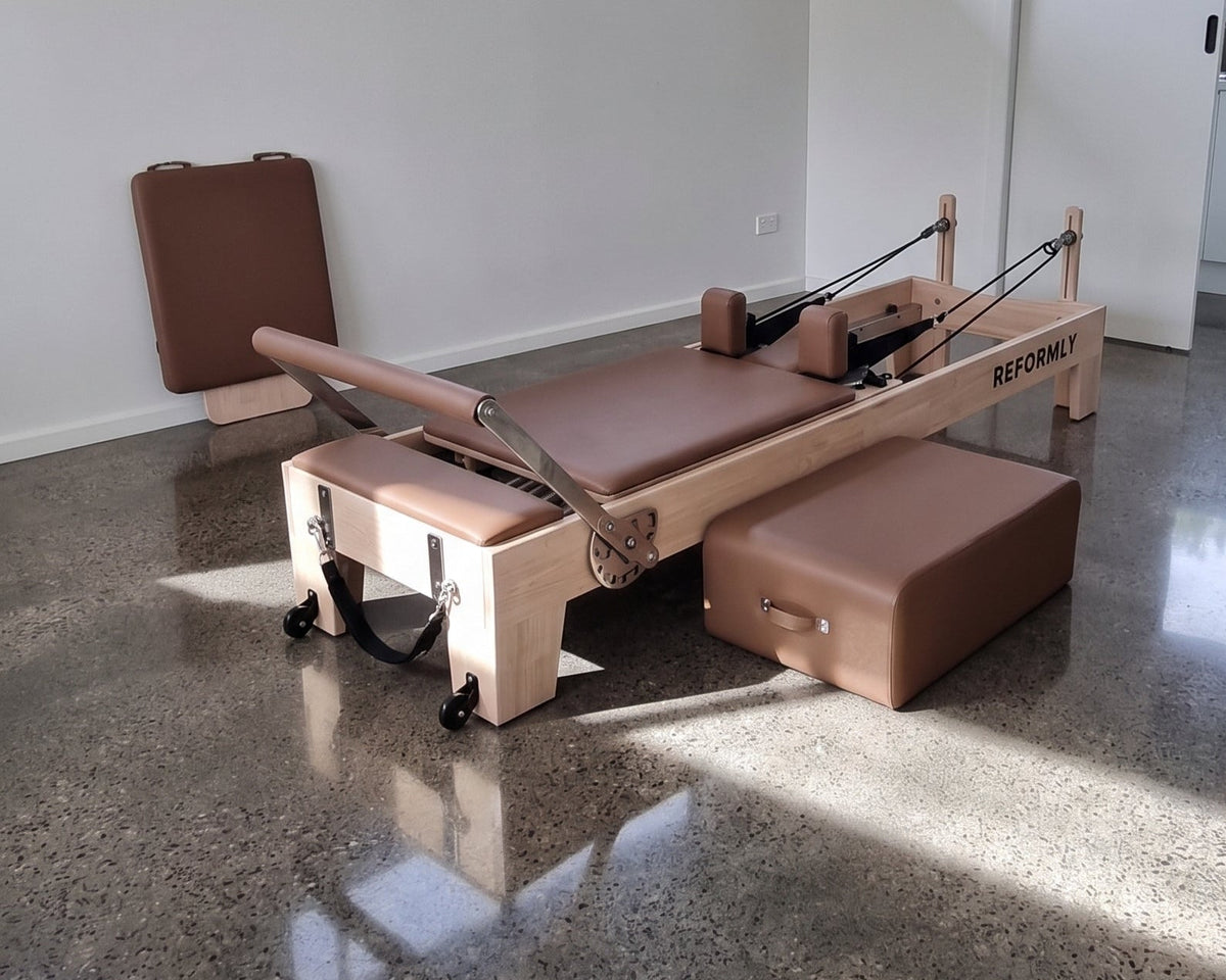 Reformly Original Pilates reformer in brown