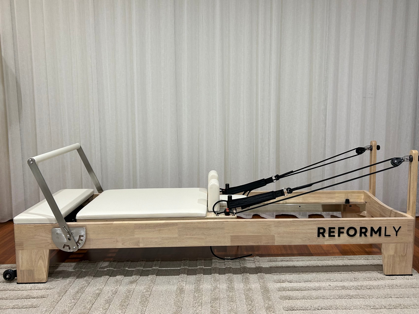 White Original Reformly — Oak Reformer Pilates Machine