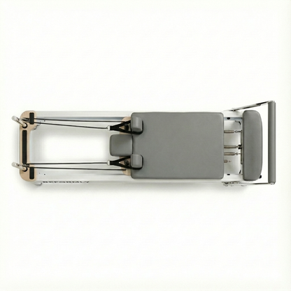 Reformly aluminium reformer pilates machine with grey leather and white frame