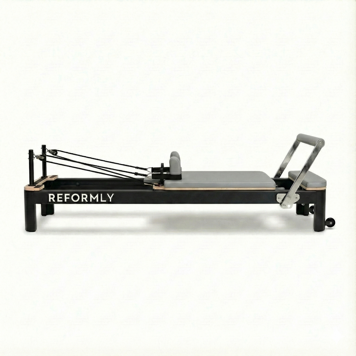Reformly Aluminium fixed frame Pilates reformer, black frame, grey leather