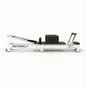 Reformly Fold foldable aluminium Pilates reformer, black leather, white frame