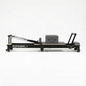 Reformly Fold foldable aluminium Pilates reformer, grey leather, black frame
