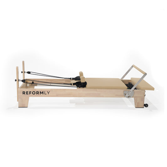 Tan Original Reformly — Oak Reformer Pilates Machine