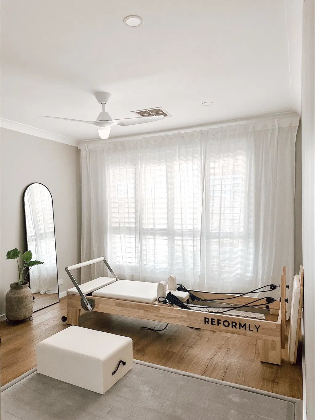 White Original Reformly — Oak Reformer Pilates Machine