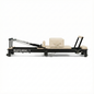 Reformly Fold foldable aluminium Pilates reformer, white leather, black frame