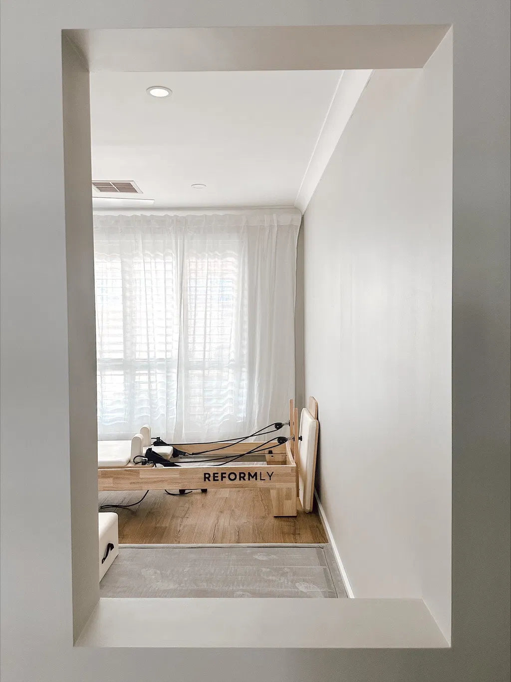 White Original Reformly — Oak Reformer Pilates Machine